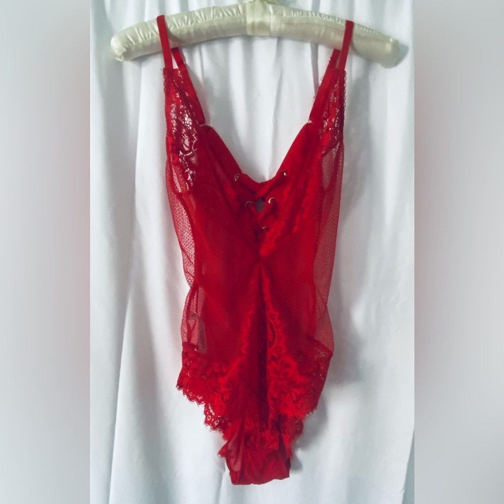 Secret Possessions red lace bodysuit. Size Small